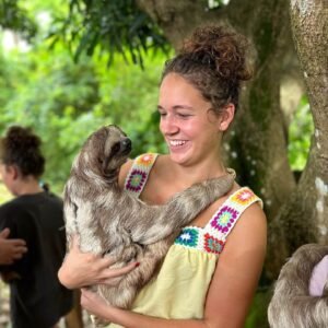 Holding a sloth in Roatan